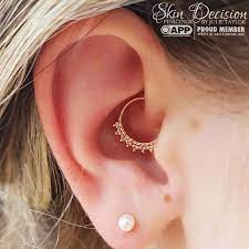 Her Royal Highness This Daith Is Majestic Holding A Solid Gold Nova Ring By Scylla Fine Jewelry Be Y Yellow Gold Jewelry Large Hoop Earrings Daith Jewelry