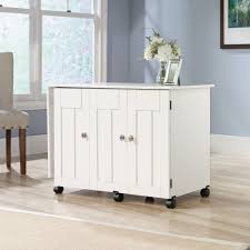 Designed to cleverly fit into any unused space, a custom craft room is the perfect place for everyone whether they enjoy scrapbooking, sewing, or painting. Sauder Sewing And Craft Table Soft White Finish Walmart Com Walmart Com