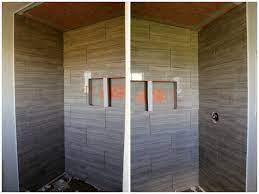 Tiling shower wall surface with vertical 12×24. Turtles And Tails Bathroom Reno Tile Is In We Re Nearing The End