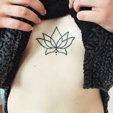 The seed sprouts at the bottom of a pond and then pushes up through the layers of rocks and mud and water to the. 40 Beautiful Lotus Flower Tattoos