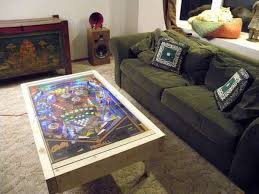 This modern take on the classic pinball game is so fun it's addictive. Arcade Furniture Creations Pinball Coffee Table