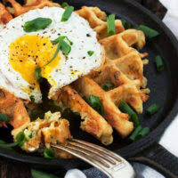 These homemade sweet potato fries were one of the biggest hits at a recent memorial day bbq party for 40 people (yes, crispy sweet potato fries for 40!) and it is all thanks to one secret ingredient that makes these crispy fries! Loaded Potato Waffles With A Crispy Fried Egg Seasons And Suppers
