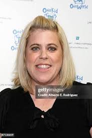 Actor Brady Smith and actress Tiffani Thiessen attend the OneKid... News  Photo