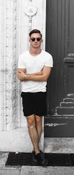 Black And White Shorts Outfit Men Simple Summer Outfit Inspiration With Ray Ban Wayfarer Sunglasses White T Shirt Black Shorts Wrist Spring Outfits Men Summer Outfits Men Simple Summer Outfits
