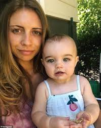 Incredible moment 15-month-old baby girl shows off her snowboarding skills 