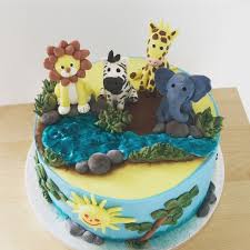 Un Gateau Sur Le Theme De La Savane Biscuit Leger Chocolat Avec Ganache Chocolat Lait Caramel Animaux De La Ganache Chocolat Au Lait Pate A Sucre Caramel