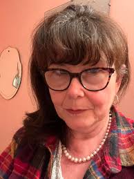 This is me, 61 today, pearls and plaid. Size 7.