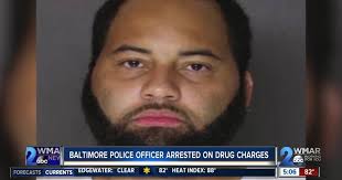 Baltimore police officer charged in drug arrest