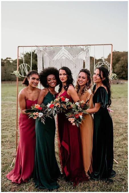 bridal party with jewel toned mismatched bridesmaid dress
