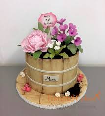 Sending birthday flowers is a special way to remind your family and friends how happy you are that they are in your life. Flowerpot Birthday Cake Mum S 70th Birthday Tasteful Cakes By Christina Georgiou