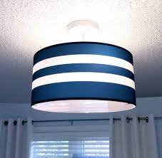 A classic arts & crafts piece, it features handcrafted art glass in shades of sapphire blue, warm honey, amber and cream. Navy Stripes Light Fixture Children Lights Firefly Home Kids Lighting