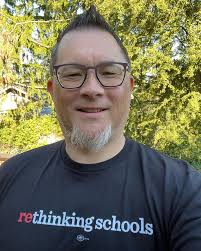 Rethinking Schools editor Wayne Au (@profwayneau) just got his new  Rethinking Schools T-shirt in the mail! Want one of your own? ⁠ ⁠ Visit  rethinkingschools.org. (Link in bio)