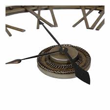 Decorative wrought iron clocks are available in many designs from rustic to contemporary. Charles Bentley Extra Large Wrought Iron Wall Clock Bronze Wilko