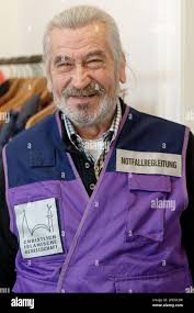 Cologne, Germany. 17th Dec, 2021. Boxer-dog-mix Odett stands in front of  the Konrad Adenauer animal shelter. (to dpa: "Animal rights activists: In  pandemic even more so no animals for Christmas") Credit: Henning