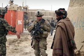 An afghan national army soldier surveying atop a humvee; Ssha Afganistan God Spustya Boevaya Missiya Zakonchena Vojna Prodolzhaetsya Mezhdunarodnaya Panorama Tass
