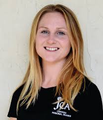 What is the physiological purpose of incorporating higher intensity  workouts into the latter half of long runs?