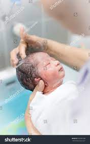 Step 2 unfold the fresh diaper. Bathing A Newborn Baby Boy Newborn Baby