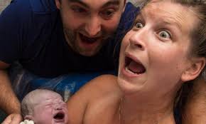 Woman gives birth to a girl instead of a boy and photos perfectly capture  the surprise
