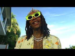E we're caught in the moment. Still Wiz Wiz Khalifa Letras Com