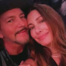 EDDIE VEDDER with his wife Jill at TAYLOR SWIFT's final show of her “Era's  Tour” in Vancouver last December. (Photo credit: Jill Vedder)