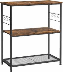 Instead, get yourself some kitchen wall shelves that allow you to have your everyday items close at hand. Buy Vasagle Baker S Rack Kitchen Shelf Kitchen Island Microwave Oven Stand With 3 Open Shelves 6 Hooks Metal Frame 31 5 X 15 7 X 35 4 Inches Industrial Rustic Brown And Black Ukki002b01 Online In Turkey B08t9k3rzr