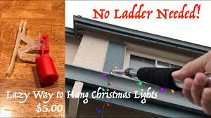 5 00 The Lazy Way To Hang Christmas Lights On The Gutter No Ladder Needed Laderlless Light Clips Youtube