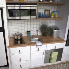 It's easy to keep everything to hand without having to march from sink to hob to fridge. Pin By Sonia Pereira On Dreams Tiny Kitchen Design Small Kitchenette Tiny House Kitchen