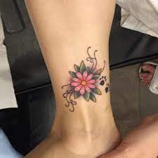 30 Small Daisy Tattoo Design Ideas With Meanings Small Daisy Tattoo Daisy Tattoo Designs Daisy Flower Tattoos