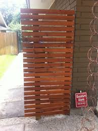 Custom built 3/4 thick stock cedar lattice enclosure for large trash and recycle cans. Side Fences To Hide Trash Cans Home Creative Outside Decor Hide Trash Cans Outdoor Garbage Outdoor Garbage Bin