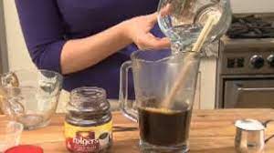 In sealable jar, combine instant coffee, sugar and warm water. How To Make Instant Iced Coffee Youtube