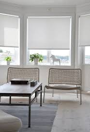 Style each bay window is unique. Roller Shades On Bay Window In Contemporary Interior Living Room Blinds Roller Blinds Kitchen Window Roller Blinds