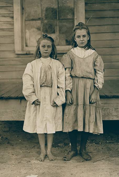 South Carolina, 1908... Photographer's Caption Grace Harper (Looked 10  years old). Works in Lydia Mills, Clinton, S.C. Mother said she is very  good hand at spinning. Been at it 3 years. Runs
