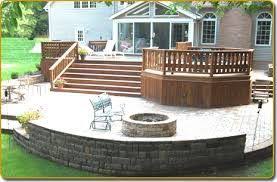two tiered decks wood and stone google search patio stones decks backyard tiered deck