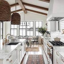 The globe lighting adds another modern touch. 50 Best Modern Farmhouse Kitchen Island Decor Ideas 27 Modern Farmhouse Kitchens Farmhouse Style Kitchen Beautiful White Kitchens