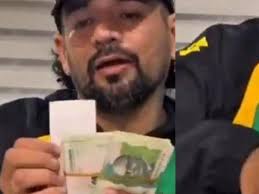 Halló cerca de $5.000 con papel que decía: 'cuentas por pagar', hizo video  para buscar al dueño