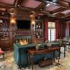 A home office with a library space featuring multiple white bookshelves lighted by wall lights. Https Encrypted Tbn0 Gstatic Com Images Q Tbn And9gcr1vki5ykwumqyw Dodn0ficonqnkdrlrzkivlehutykjugmk 7 Usqp Cau