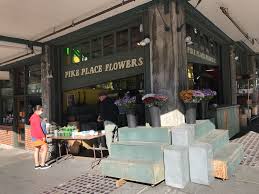 Discover three of seattle's bustling neighborhoods: Pike Place Flowers Has Reopened Seattle