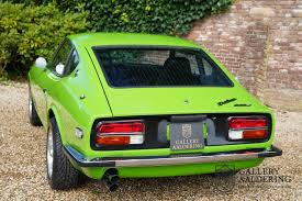Image result for Apple Green 1959 Datsun