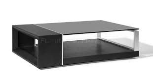 This piece comes in your choice of available finishes, polished for an extraordinary shine, and topped in thick, clear glass, tempered for extra strength. Treble Coffee Table Beverly Hills Espresso W Black Glass Top