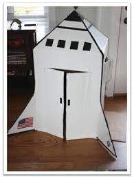 Your satellite needs some sort of container to hold all of the gizmos together and keep its instruments safe. Inspireme Crafts 92 Crafty Days Of Summer Cardboard Rocket Cardboard Box Space Theme