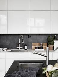 Keeping the rest of the scheme light keeps the room feeling airy despite the abundance of dark grey. 25 Concrete Backsplashes For Trendy Kitchens Shelterness