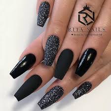 Black nail polish was purely reserved for goths and punks. Theglitternail Get Inspired On Instagram Matte Glossy Black And Black Glitter O Black Nails With Glitter Black Nail Designs Nail Designs Glitter