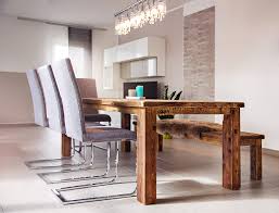 Prop yourself up on your dining room stool for a new take on dining room seating. Edictum Unikat Mobiliar Dining Set With Bench