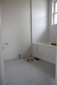 Modern penny tiles are available in a variety of materials that vary from porcelain to cork! House Tweaking