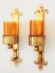 It includes two sconces, all crafted from iron in a classic black finish. Pair Of Spanish Gothic Style Gilt Wrought Wall Sconces With Amber Glass Shades At 1stdibs