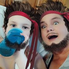 How do I stop my 6 year old grandson from hitting himself in the head  during a melt down. It breaks my heart