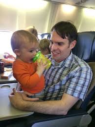 How To Survive Flying With A Lap Toddler Trips With Tykes Toddler Travel Flying With A Toddler Traveling With Baby