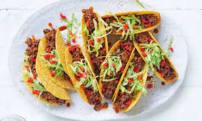 To assemble each taco, stack 2 warm tortillas and top with a couple of pieces of fish, then a spoonful of slaw. Our Best Taco Recipes Coles