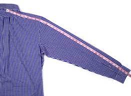 Measure to the center of the meaty part. How To Measure A Shirt