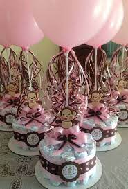 Guide To Hosting The Cutest Baby Shower On The Block Monkey Girl Baby Shower Monkey Baby Shower Baby Shower Diapers